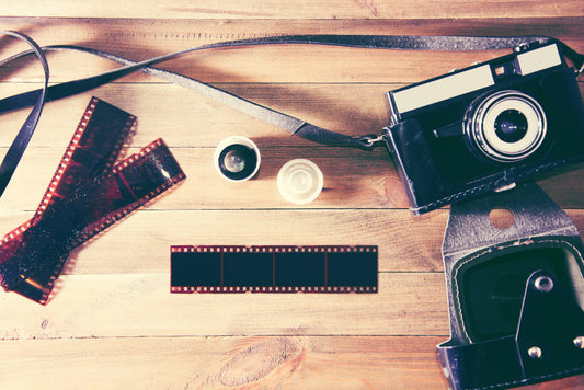 negatives and a camera on the table 