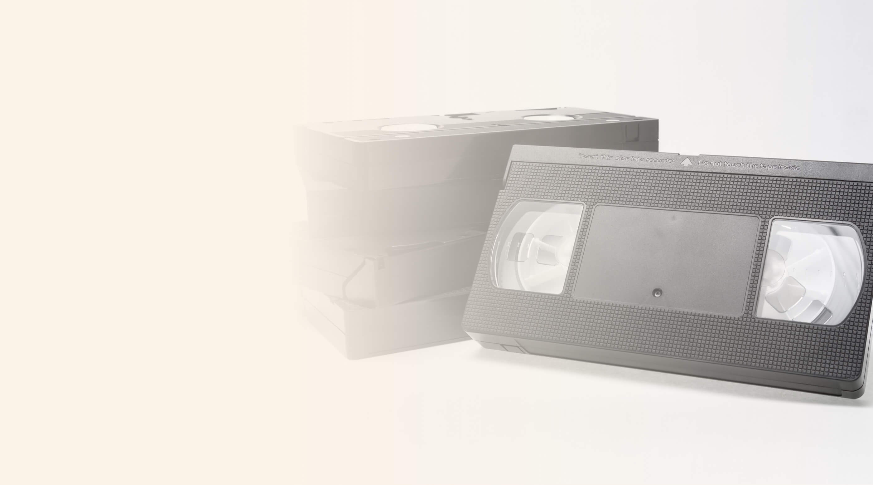 Close-up of two VHS tapes stacked