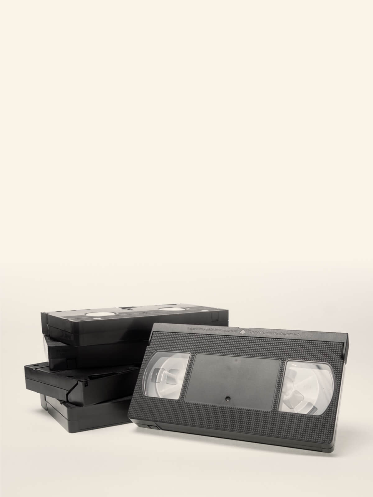 Close-up of two VHS tapes stacked
